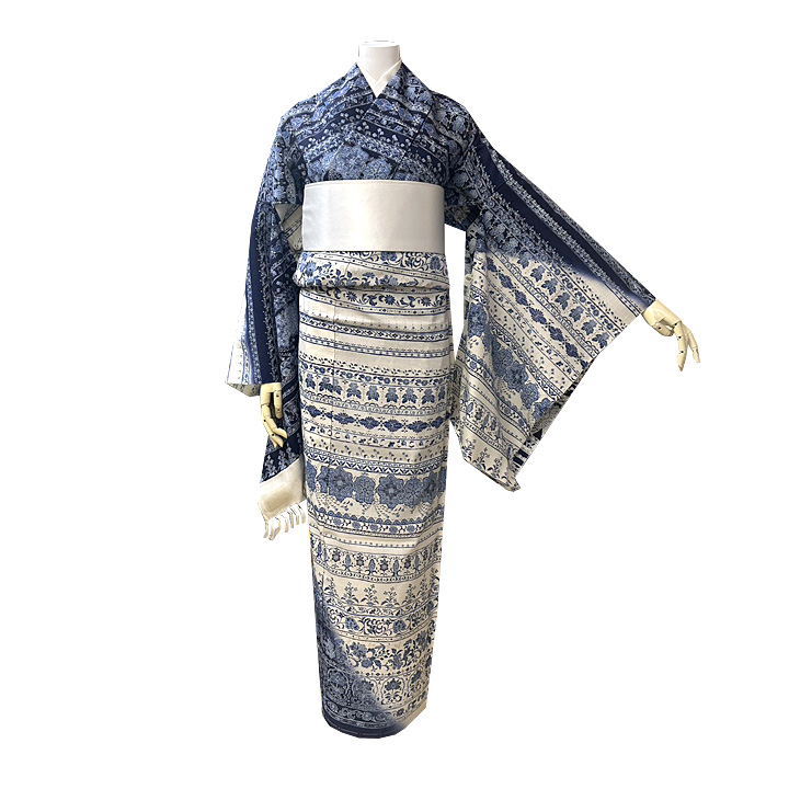 京都の伝統と革新を結びつける「生紬しょうざん」　藍色グラデーションによるモダンデザインの特撰訪問着