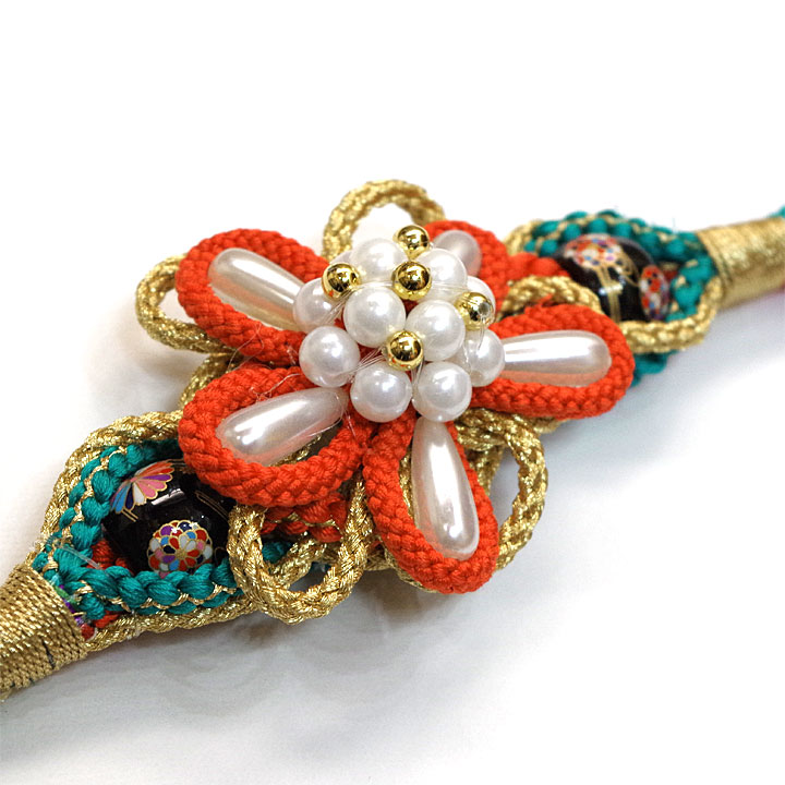 トルコブルーの彩りに豪華で可愛い正絹飾り帯締め